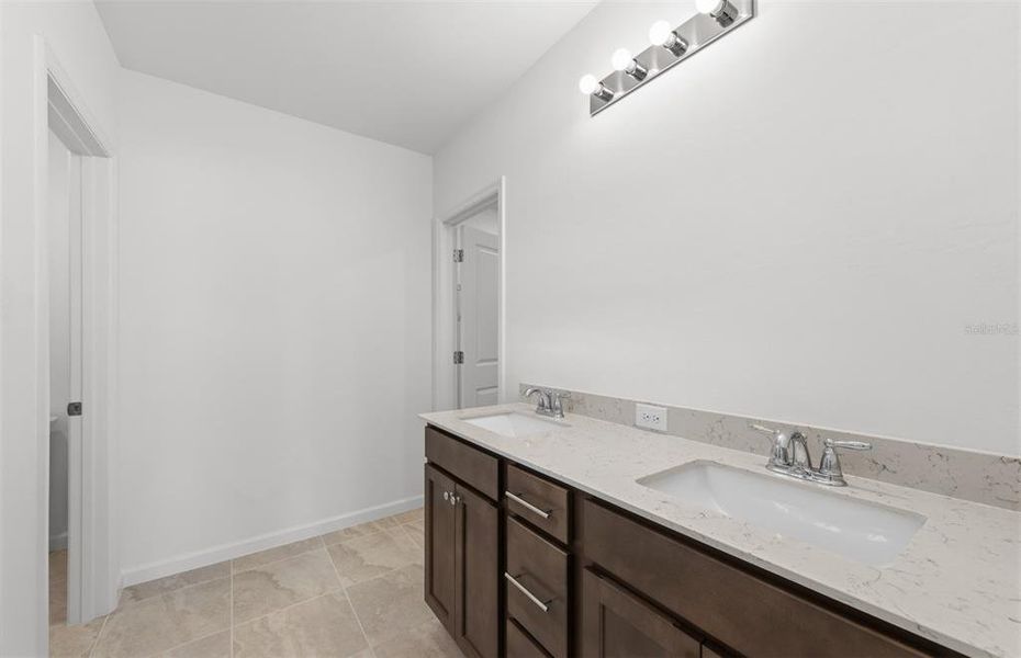 Furnished interior view inside a new home in Lakespur Wellen Park, Venice (Image 9).