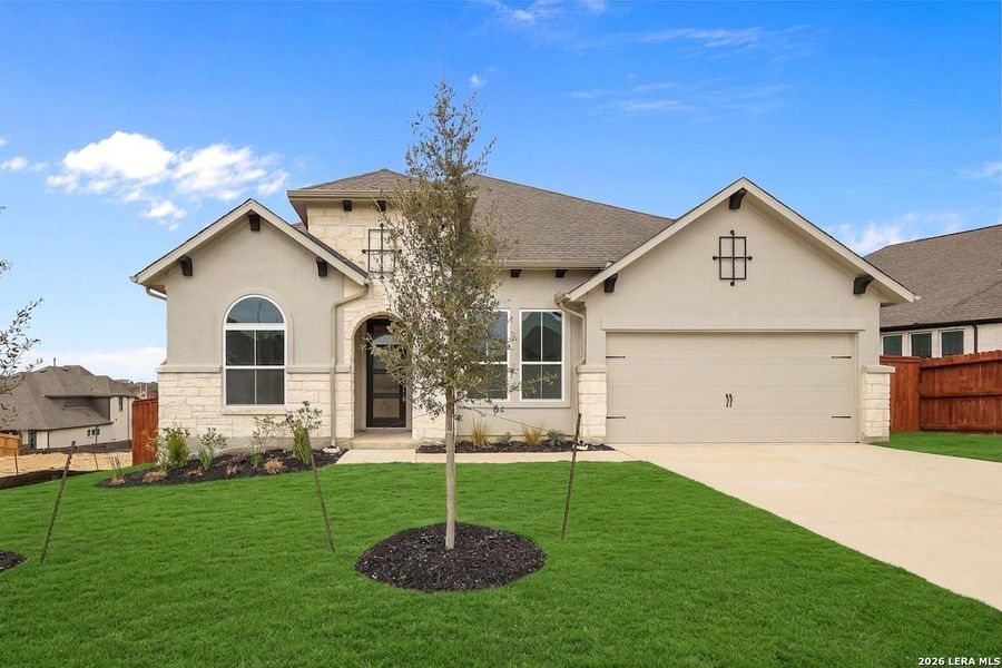 Front exterior of a new home in Homestead, Schertz, TX, highlighting curb appeal (Image 25).