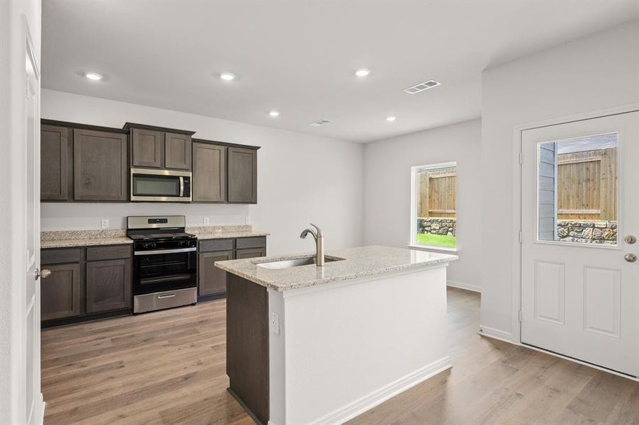 Furnished interior view inside a new home in Patriot Estates, Venus (Image 6).
