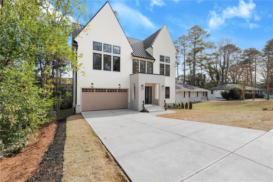 Front exterior of a new home in , Brookhaven, GA, highlighting curb appeal (Image 26). Front exterior of a new home in , Brookhaven, GA, highlighting curb appeal (Image 26).