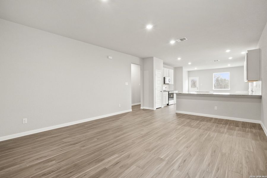 Spacious, unfurnished interior of a new home in Abbott Place, St. Hedwig (Image 24).