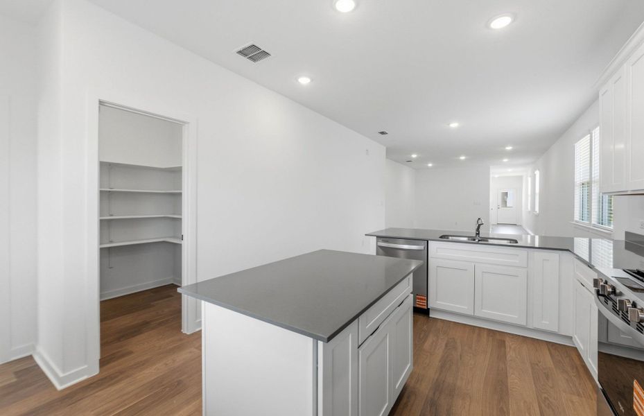 Furnished interior view inside a new home in Crosswinds, Kyle (Image 11).