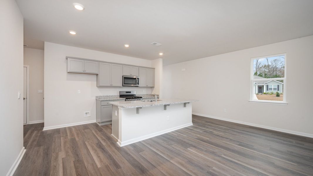 Spacious, unfurnished interior of a new home in Indigo Preserve, Leland (Image 11).