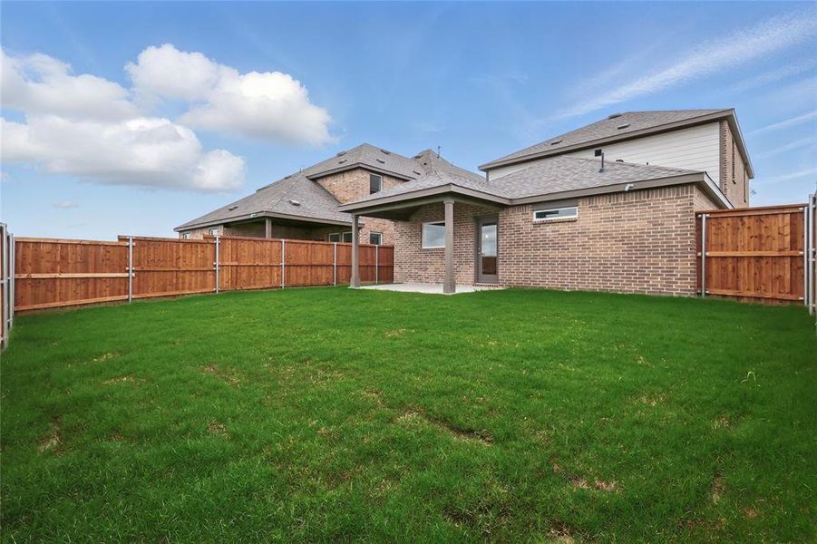 Exterior details and patio area of a home in Bel Air Village, Sherman (Image 2).