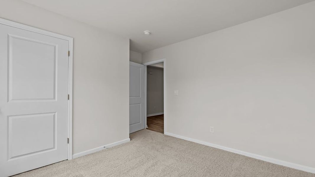 Representative unfurnished interior of a home built from the Cali by D.R. Horton in Hobbs Farm, Ayden (Image 16).