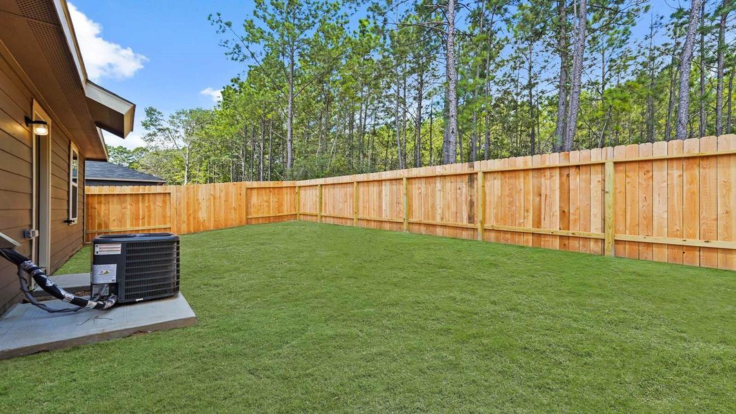 Front exterior of a new home in McCrorey Trails, Conroe, TX, highlighting curb appeal (Image 2).