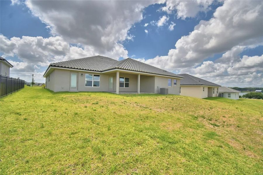 Exterior details and patio area of a home in Lake Juliana Estates, Auburndale (Image 21).