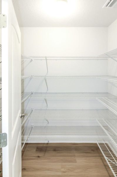 Spacious, unfurnished interior of a new home in Pecan Valley, Cantonment (Image 14).