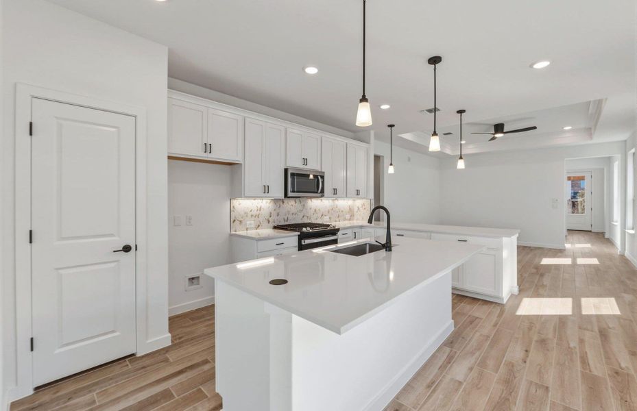 Furnished interior view inside a new home in Wolf Ranch, Georgetown (Image 12).