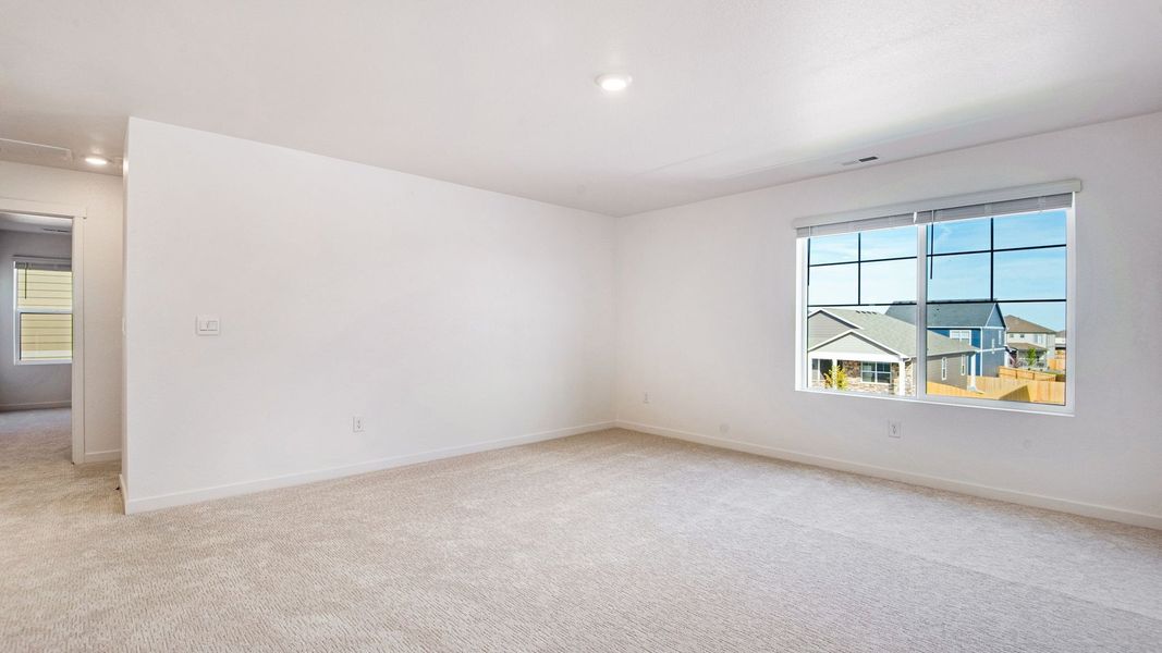 Spacious, unfurnished interior of a new home in Trails at Crowfoot, Parker (Image 20).