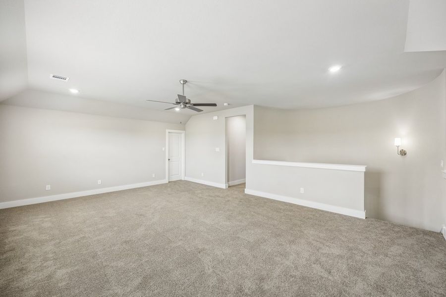 Representative unfurnished interior of a home built from the The Mockingbird by Lillian Custom Homes in Polo Ridge, Forney (Image 43).
