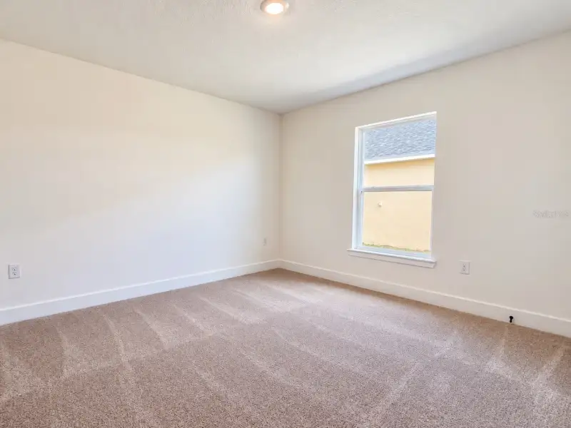Spacious, unfurnished interior of a new home in Harmony Central, Harmony (Image 11).