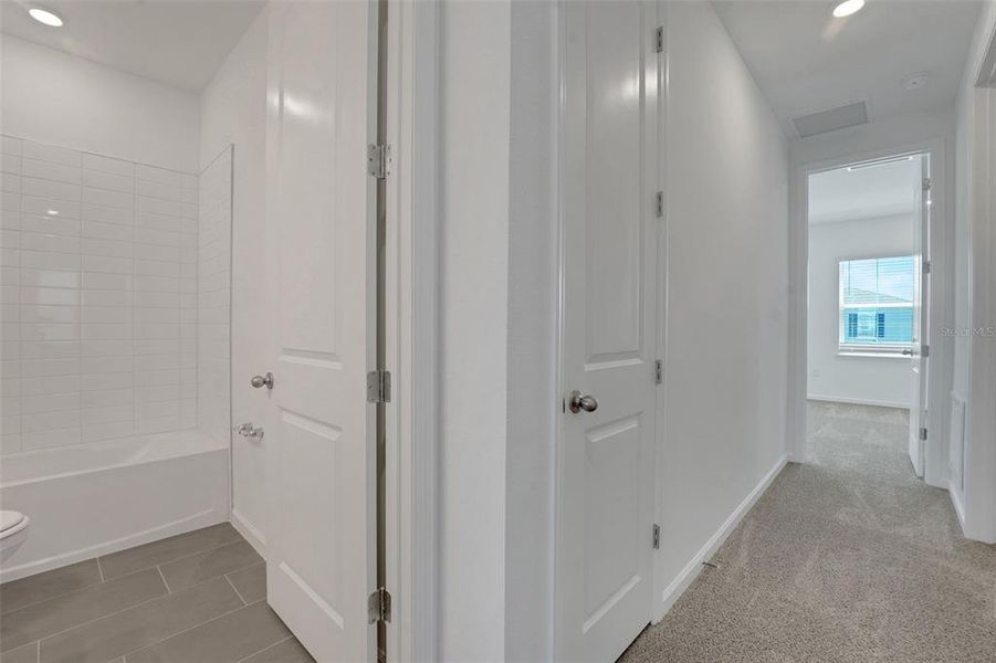Spacious, unfurnished interior of a new home in Serenade at Ovation, Winter Garden (Image 12). Spacious, unfurnished interior of a new home in Serenade at Ovation, Winter Garden (Image 12).