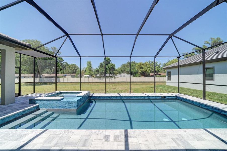 Exterior details and patio area of a home in Hidden Lakes, Brandon (Image 26).