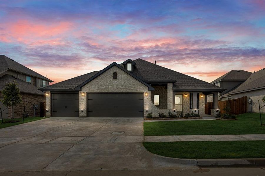 Front exterior of a new home in Hampton Park, Glenn Heights, TX, highlighting curb appeal (Image 2). Front exterior of a new home in Hampton Park, Glenn Heights, TX, highlighting curb appeal (Image 2).