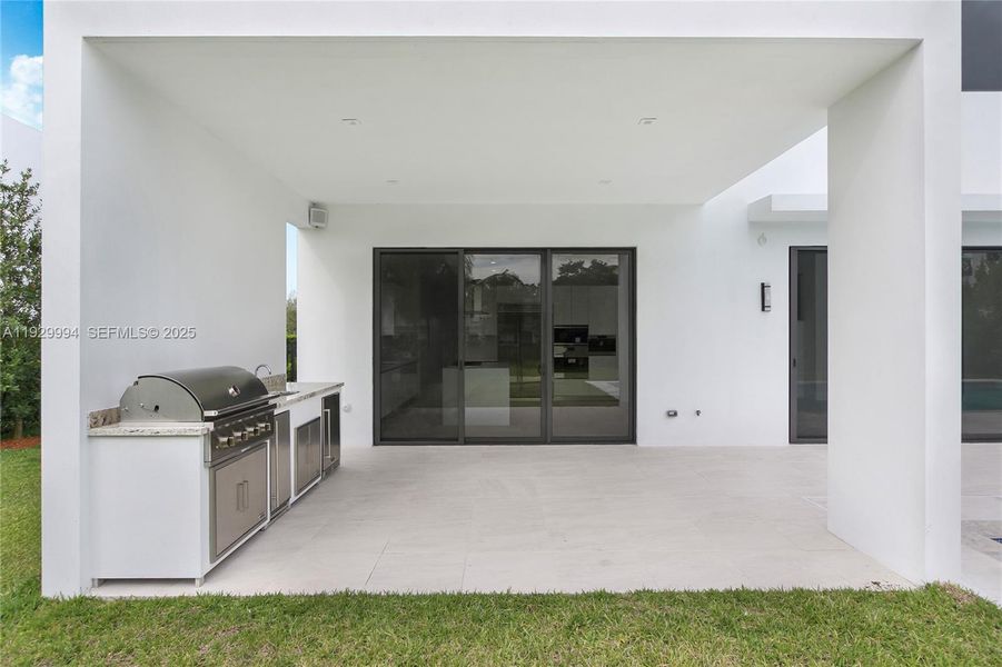 Exterior details and patio area of a home in , Weston (Image 31). Exterior details and patio area of a home in , Weston (Image 31).