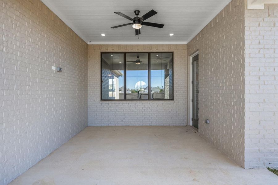 Exterior details and patio area of a home in , Bryan (Image 4).