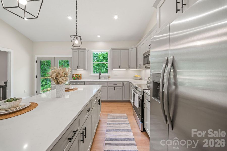 Furnished interior view inside a new home in , Waynesville (Image 9).