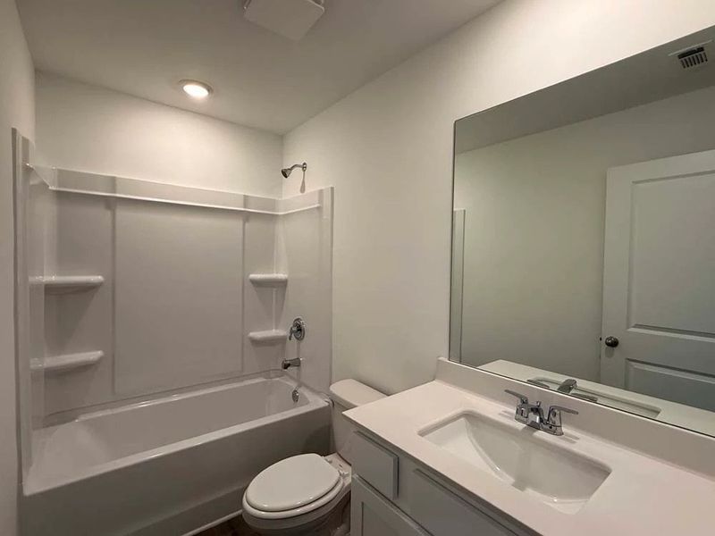 Bathroom Two featuring Timeless Collection Finishes