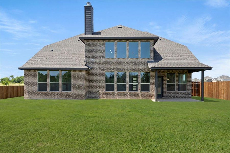 Front exterior of a new home in Lovers Landing, Forney, TX, highlighting curb appeal (Image 20). Front exterior of a new home in Lovers Landing, Forney, TX, highlighting curb appeal (Image 20).