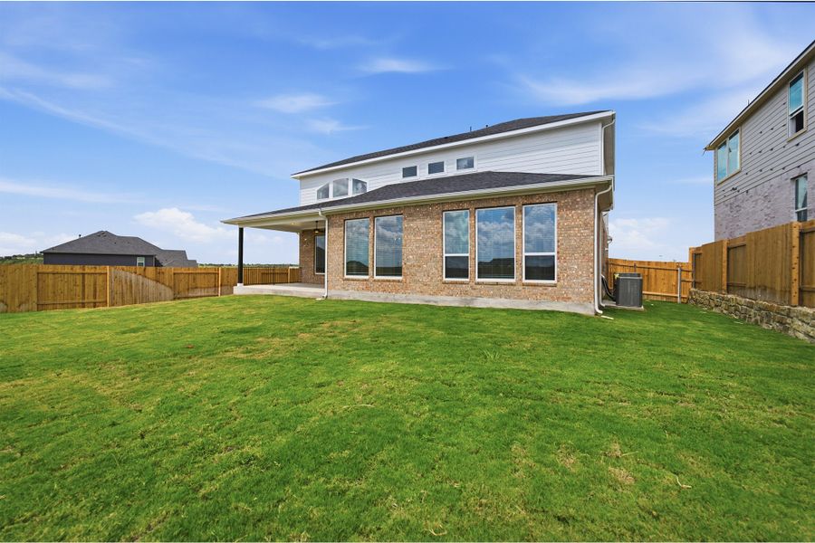 Exterior details and patio area of a home in Sunfield, Buda (Image 26). Exterior details and patio area of a home in Sunfield, Buda (Image 26).