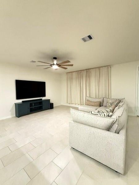 Bright and inviting living space offering the perfect setting for gathering with family and friends Bright and inviting living space offering the perfect setting for gathering with family and friends