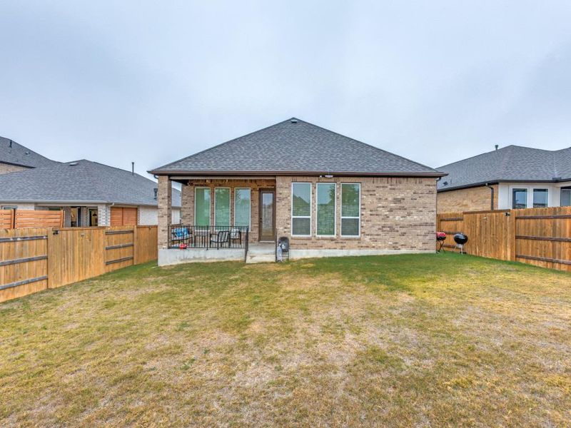 The backyard layout feels open and usable, giving you space to spread out without sacrificing comfort.