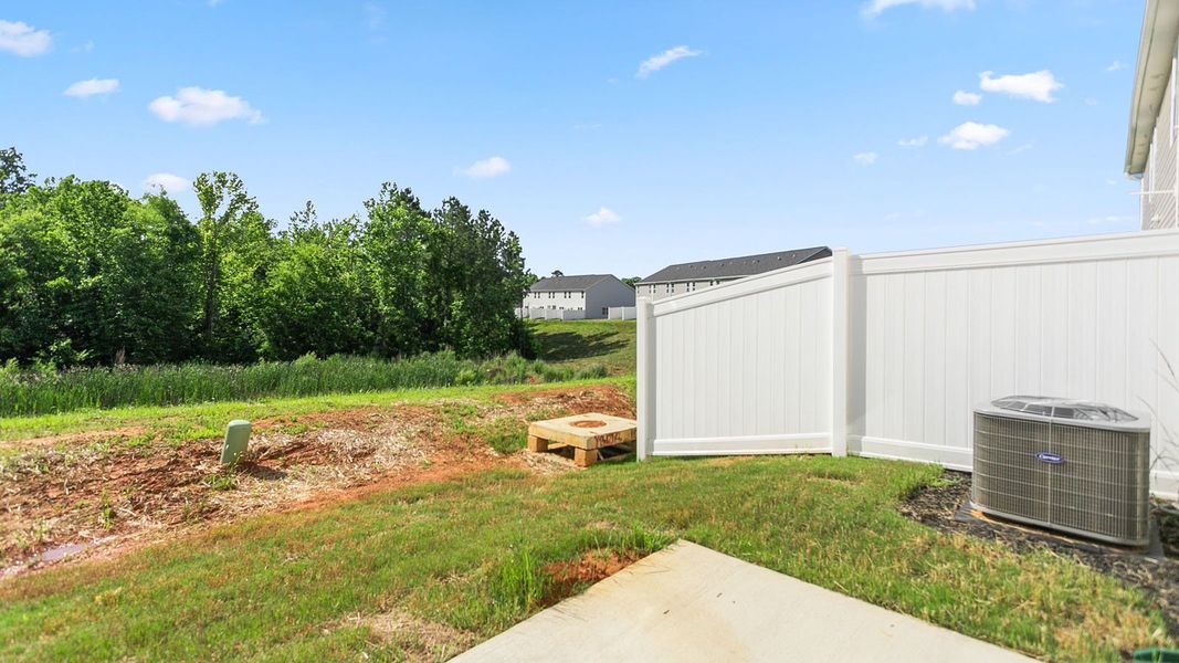 Exterior details and patio area of a home in Henley Ridge, Graham (Image 3).