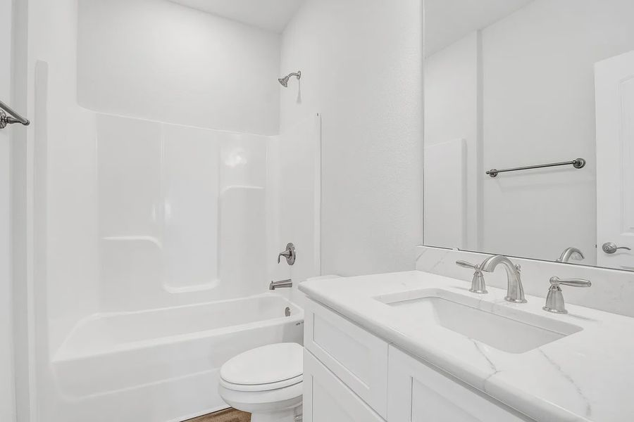 Furnished interior view inside a new home in The Bluffs at Lafayette, Freeport (Image 7).