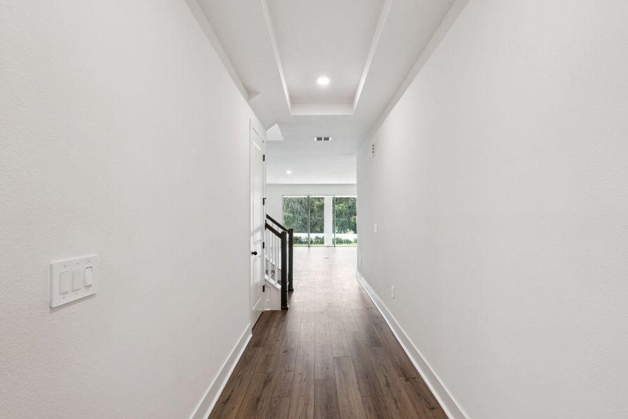 Front Entryway w/ Tray Ceiling into Great Room Front Entryway w/ Tray Ceiling into Great Room