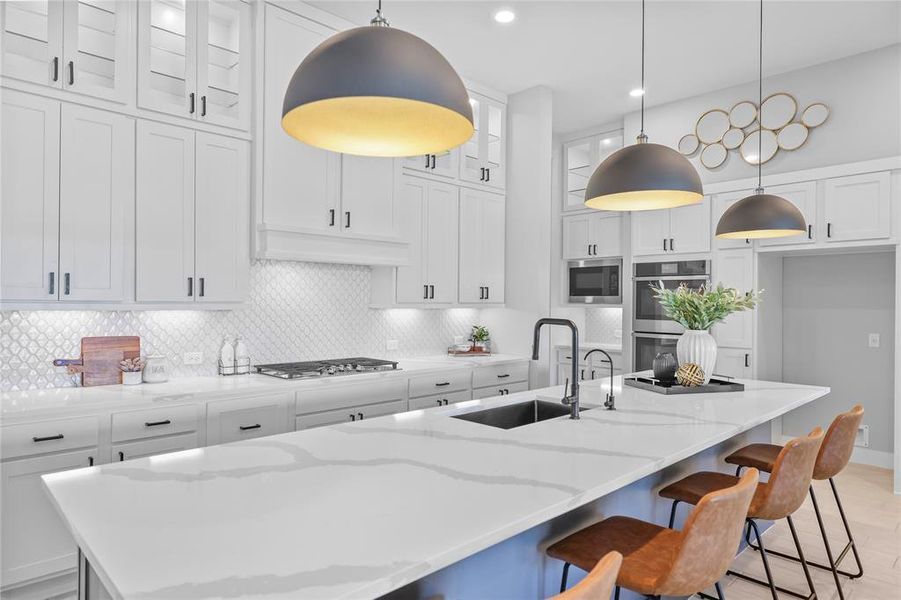 Entertain with ease around the expansive 14 ft kitchen island, a centerpiece for socializing.