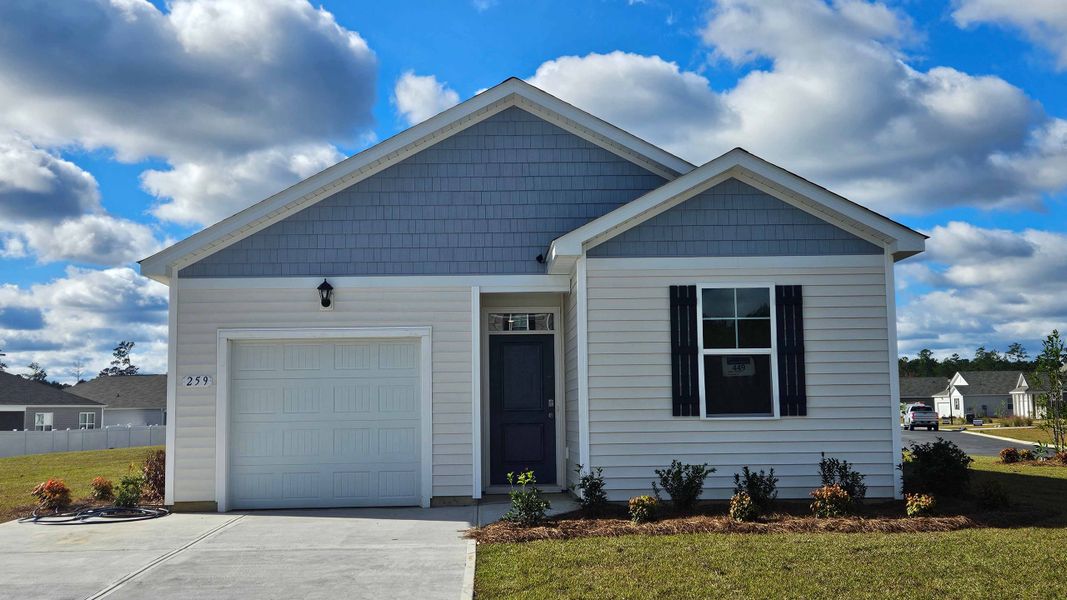 Representative exterior photo of a completed home built from the Cameron by D.R. Horton in Sandpiper Place, Myrtle Beach, SC (Image 2). Representative exterior photo of a completed home built from the Cameron by D.R. Horton in Sandpiper Place, Myrtle Beach, SC (Image 2).