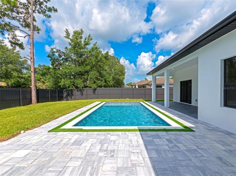 Exterior details and patio area of a home in , North Port (Image 24).