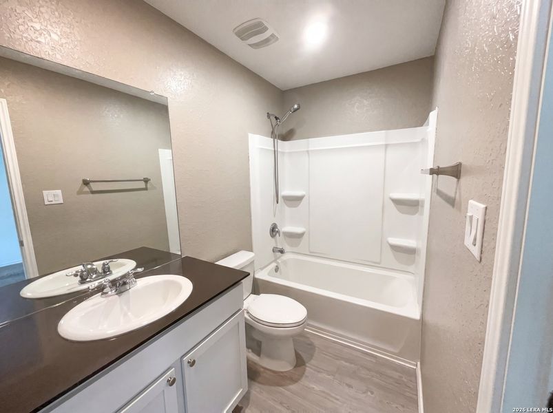 Furnished interior view inside a new home in Aston Park, San Antonio (Image 7).
