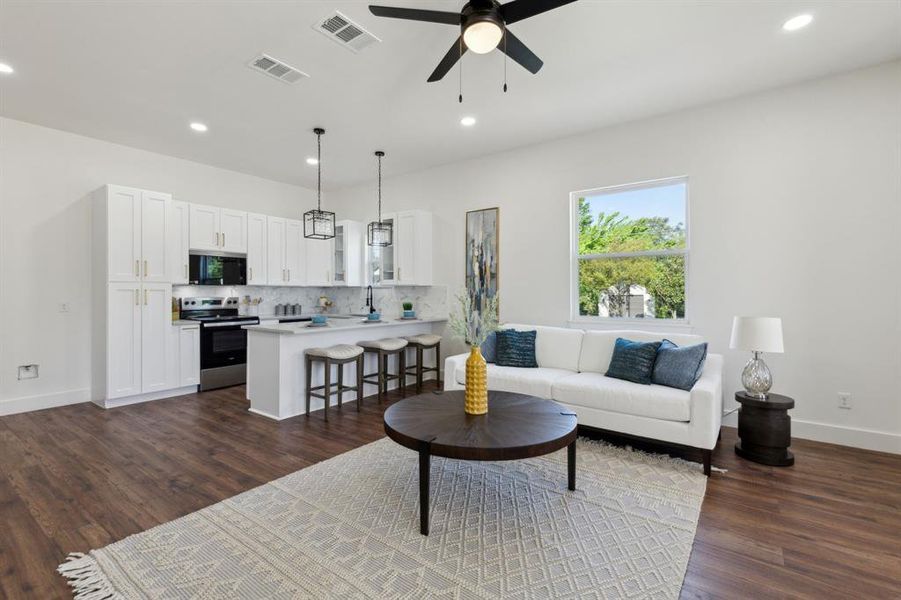 The kitchen is open to the living room The kitchen is open to the living room