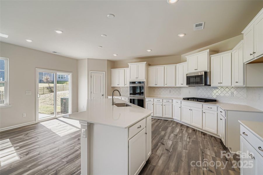 Furnished interior view inside a new home in Shannon Woods: Walk & Enclave, Maiden (Image 3).