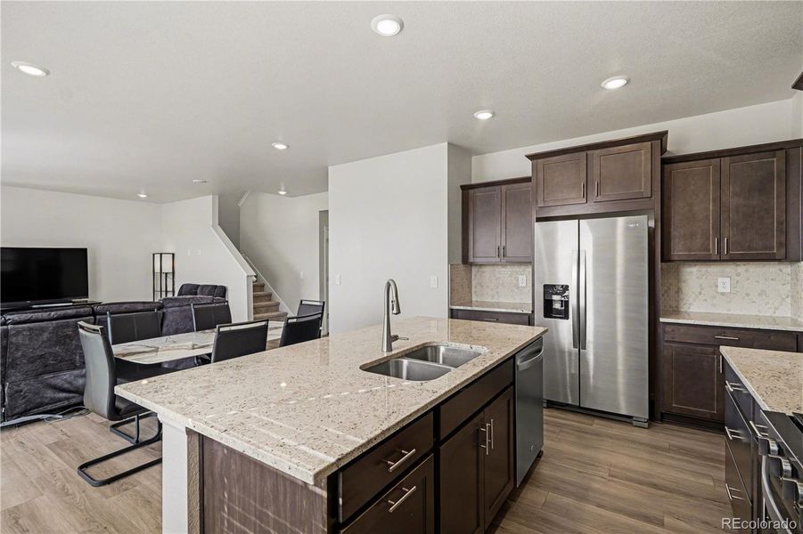 Furnished interior view inside a new home in Murphy Creek, Aurora (Image 14).