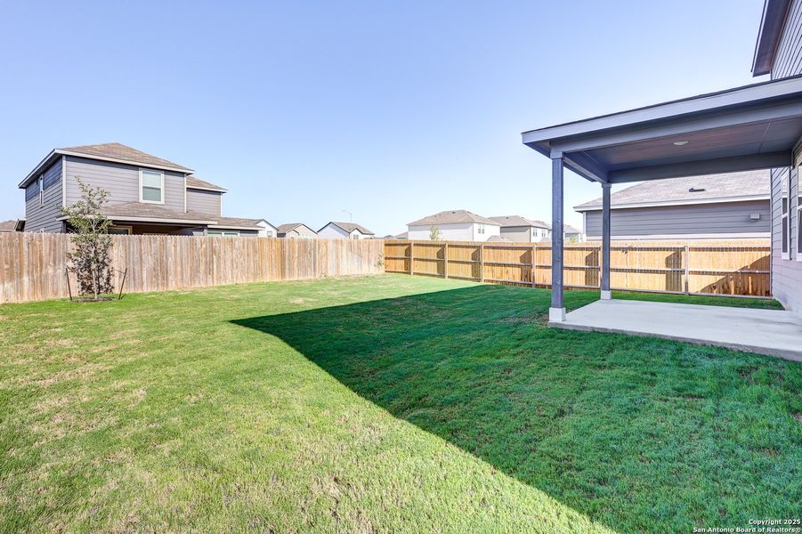 Front exterior of a new home in Hiddenbrooke, Seguin, TX, highlighting curb appeal (Image 26). Front exterior of a new home in Hiddenbrooke, Seguin, TX, highlighting curb appeal (Image 26).