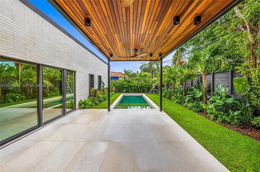 Exterior details and patio area of a home in , Miami (Image 2). Exterior details and patio area of a home in , Miami (Image 2).