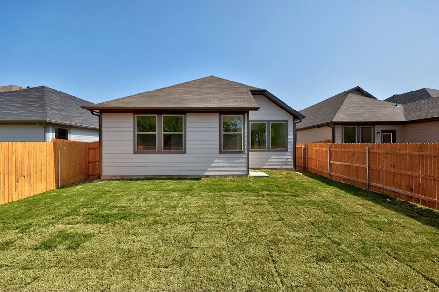 Exterior details and patio area of a home in Trinity Ranch, Elgin (Image 4).