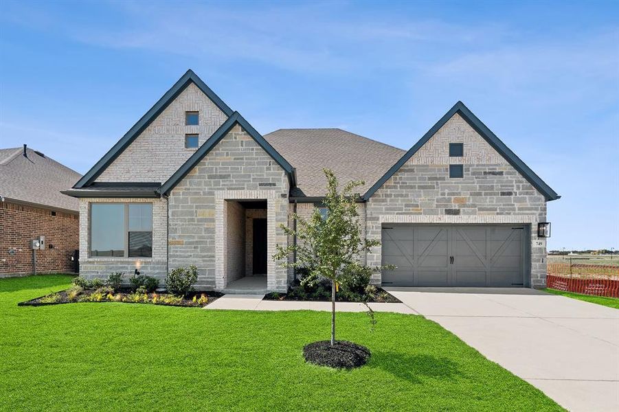 Front exterior of a new home in Myrtle Creek, Waxahachie, TX, highlighting curb appeal (Image 1). Front exterior of a new home in Myrtle Creek, Waxahachie, TX, highlighting curb appeal (Image 1).