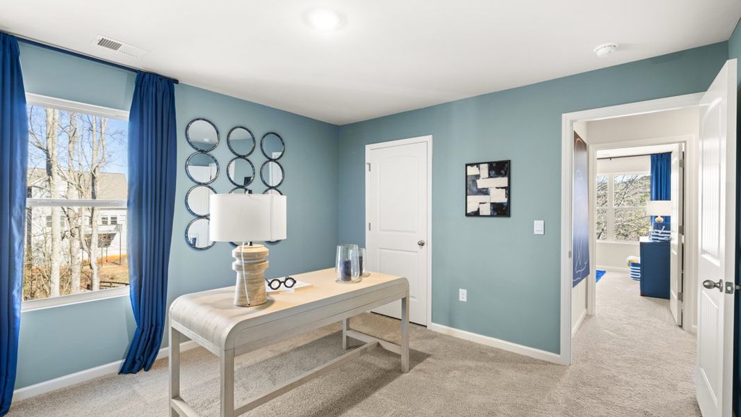 Representative furnished interior of a home built from the Hanover by D.R. Horton in Liberty Crossing, Braselton (Image 27).