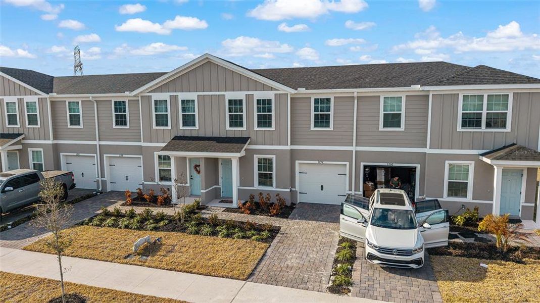 Front exterior of a new home in , Lady Lake, FL, highlighting curb appeal (Image 26). Front exterior of a new home in , Lady Lake, FL, highlighting curb appeal (Image 26).