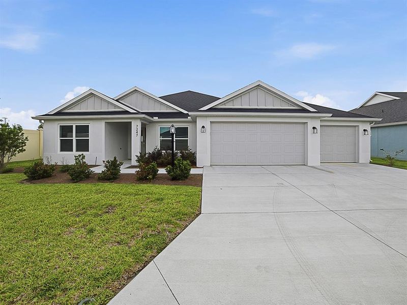 Front exterior of a new home in , The Villages, FL, highlighting curb appeal (Image 1). Front exterior of a new home in , The Villages, FL, highlighting curb appeal (Image 1).