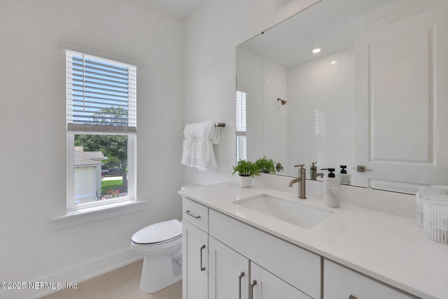 Furnished interior view inside a new home in North Beach Townhomes, Jacksonville Beach (Image 14).