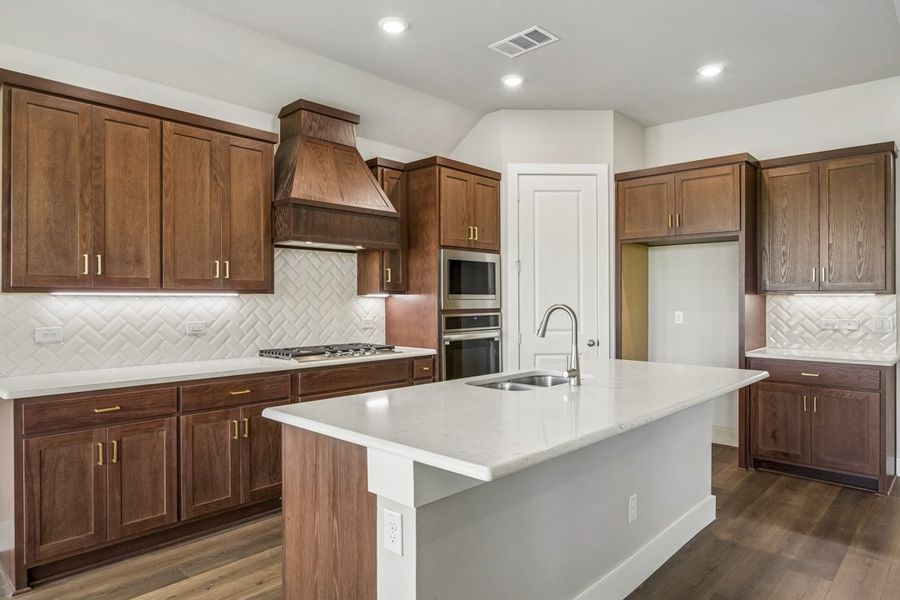 Representative furnished interior of a home built from the The Mockingbird by Lillian Custom Homes in Polo Ridge, Forney (Image 12).