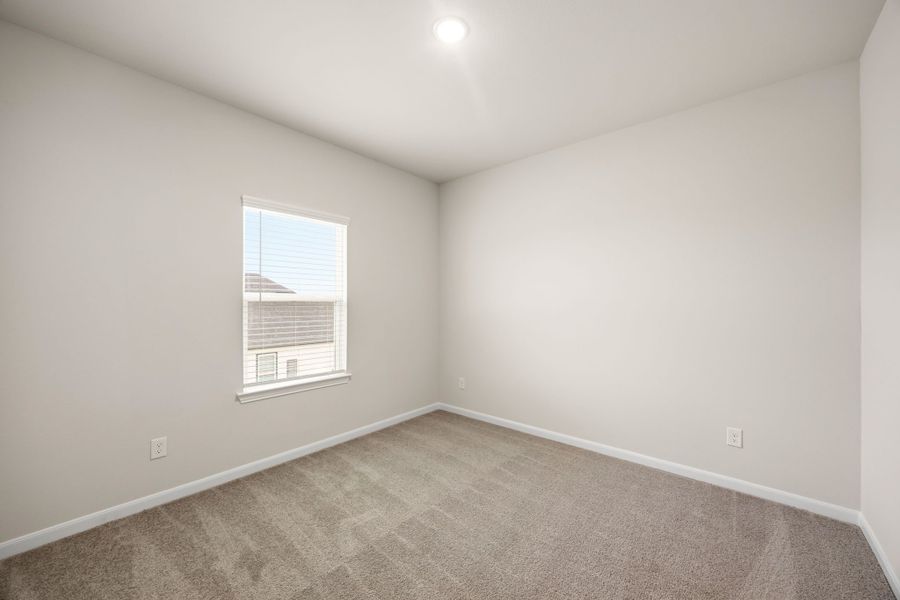 Representative unfurnished interior of a home built from the Peyton III by Cambridge Homes in Lake Park, Rowlett (Image 22).