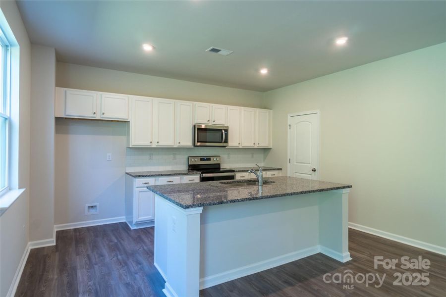 Furnished interior view inside a new home in , Charlotte (Image 8).