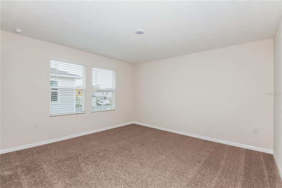 Spacious, unfurnished interior of a new home in Grove at Crosswind, Haines City (Image 13). Spacious, unfurnished interior of a new home in Grove at Crosswind, Haines City (Image 13).