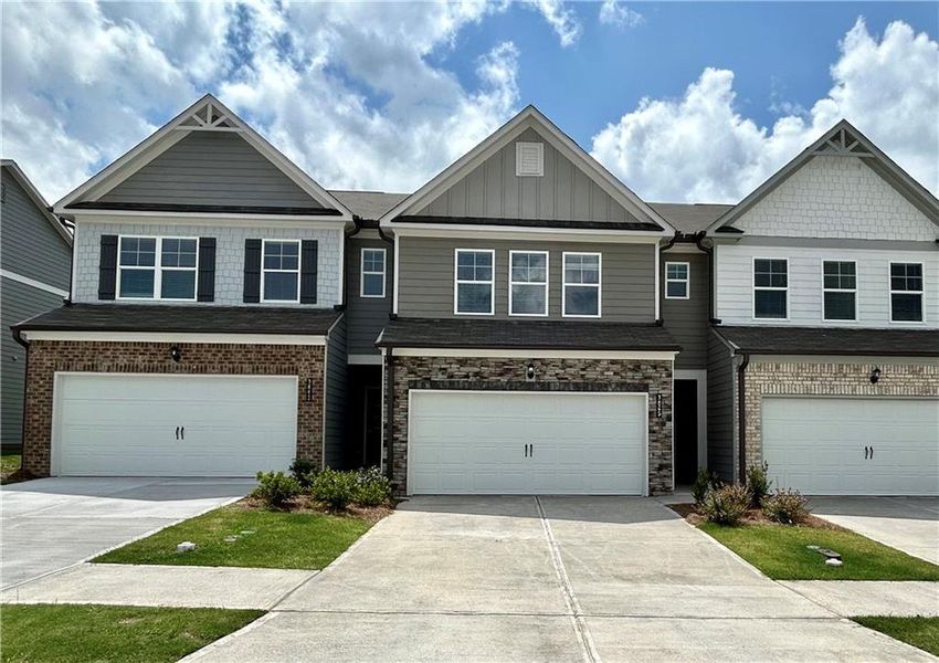Front exterior of a new home in Somerset at Riverbrook, Gainesville, GA, highlighting curb appeal (Image 23).